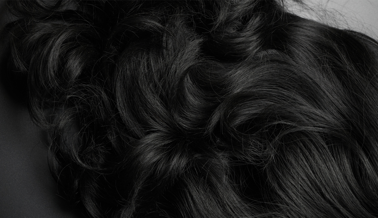 Closeup View Natural Shiny Dark Hair Bunch Black Brunette Curls Background